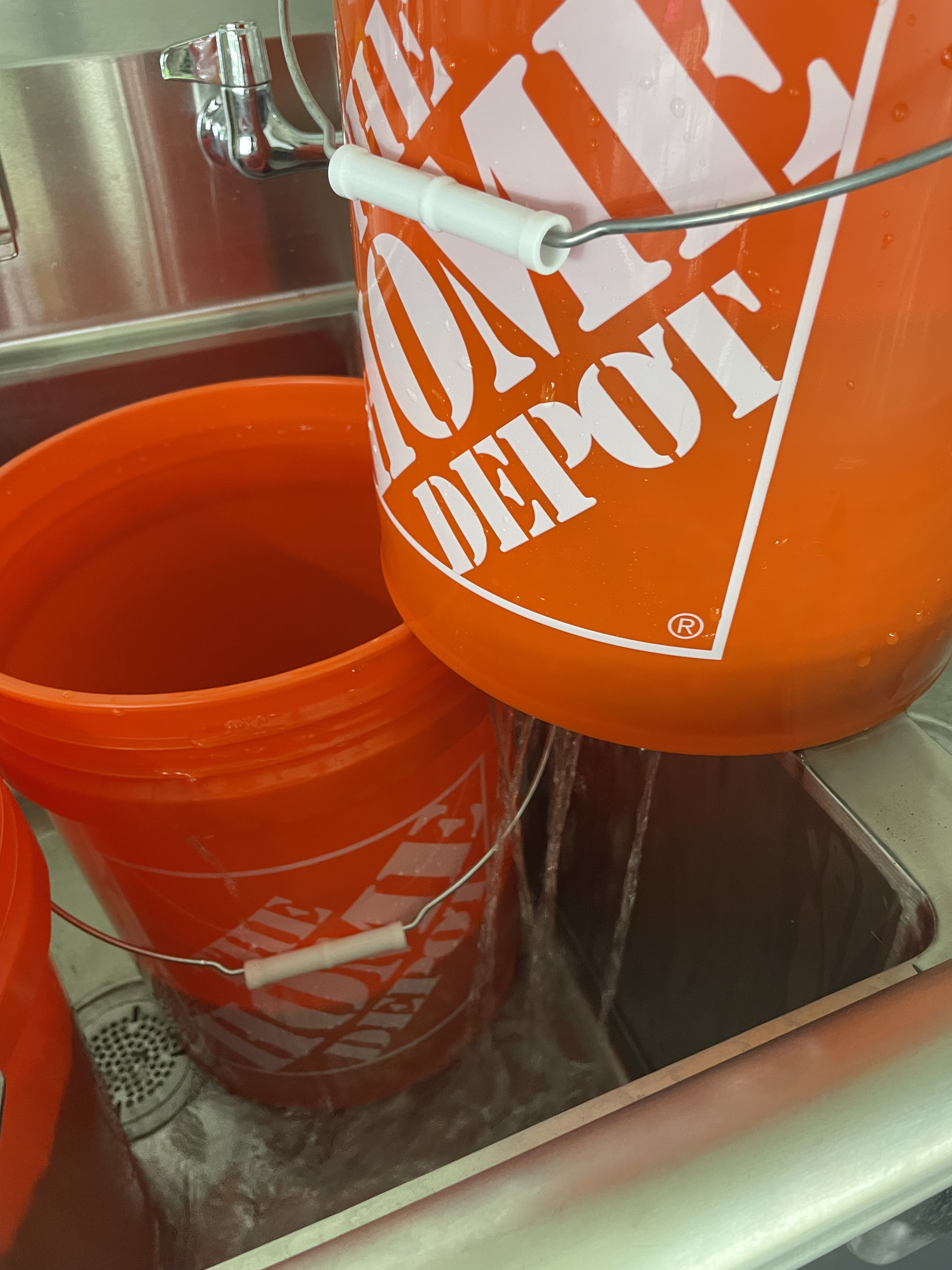 The Double Bucket System: Pulling Out the Top Bucket to Drain the Seeds